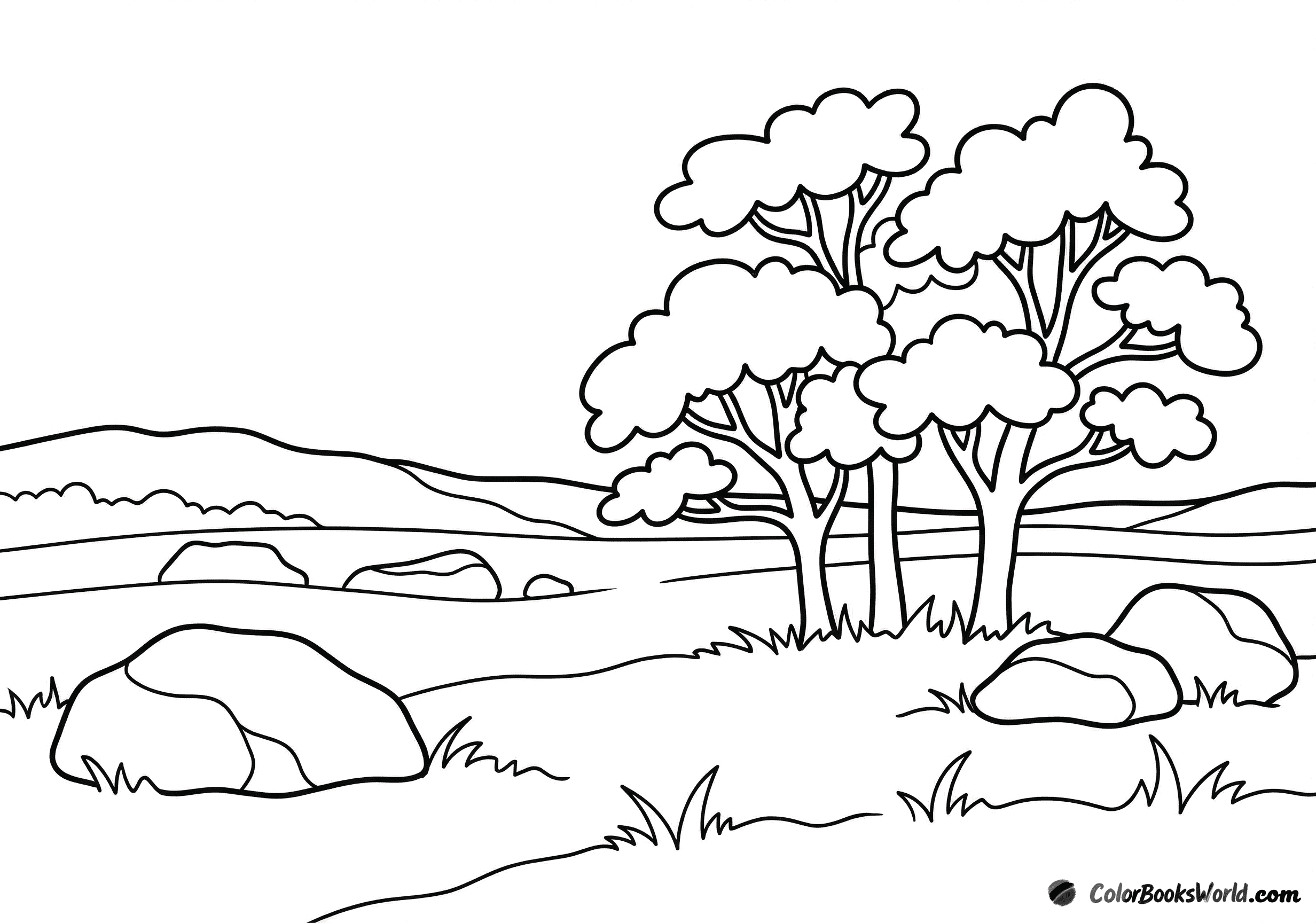 Autumn mountain meadow with scattered boulders, a low ridge in the background, and three trees.