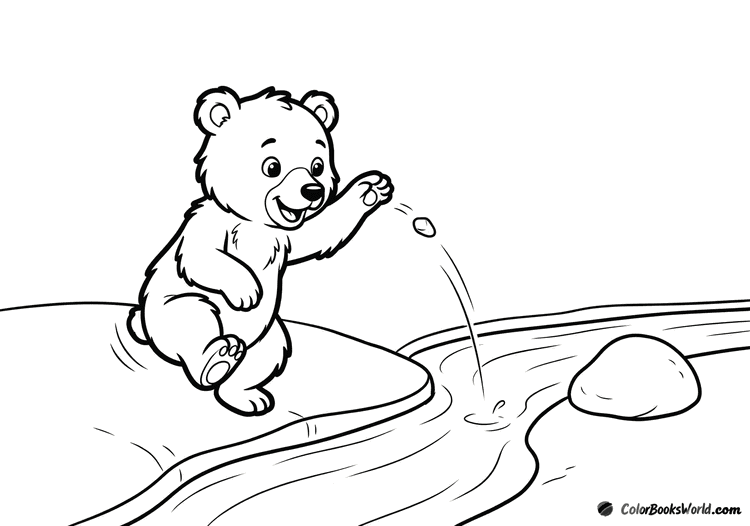 A bear cub crouches by a gentle stream, holding a pebble to toss into the water.